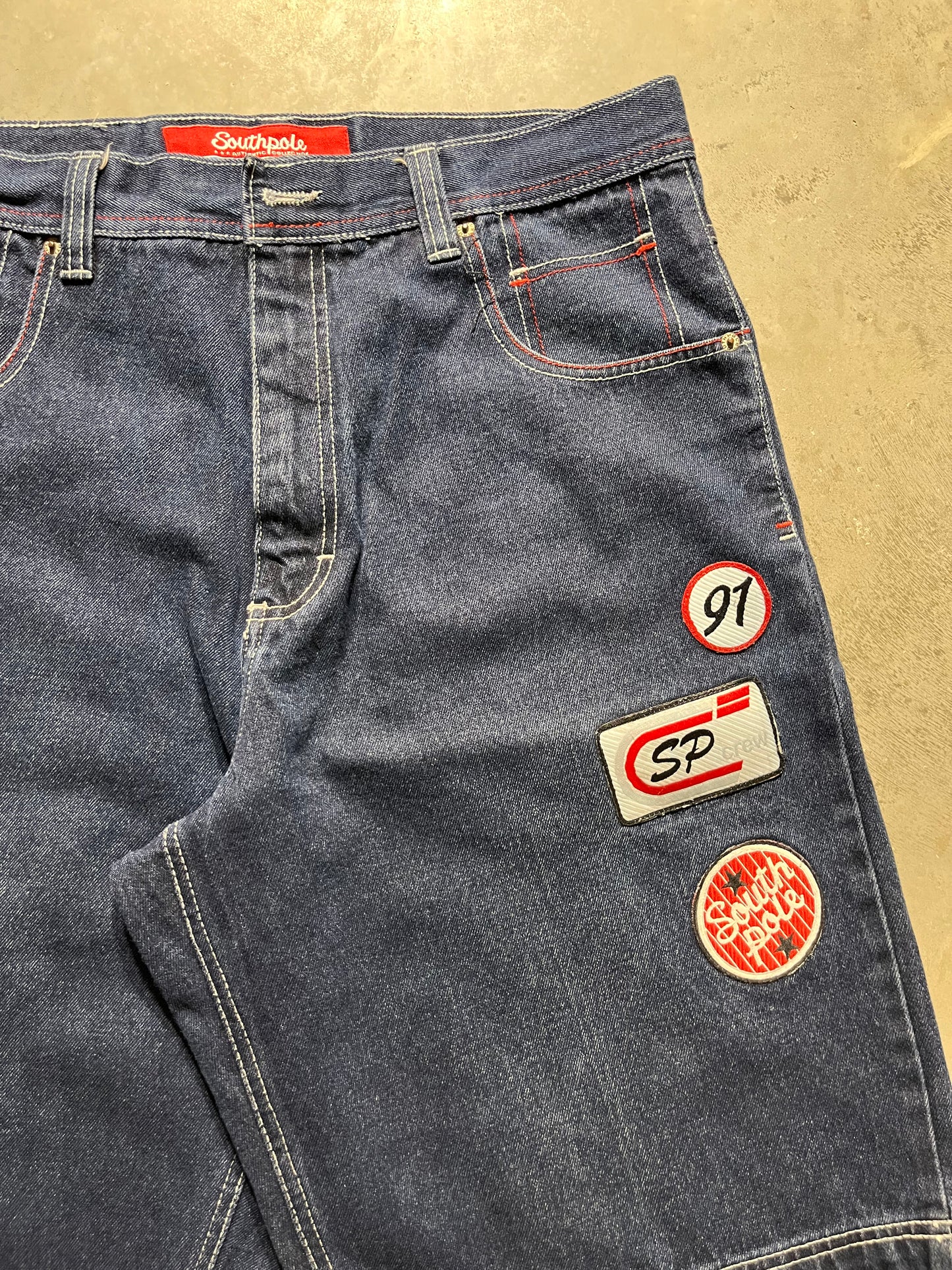 (34X12) Y2K Patch work South pole Jorts